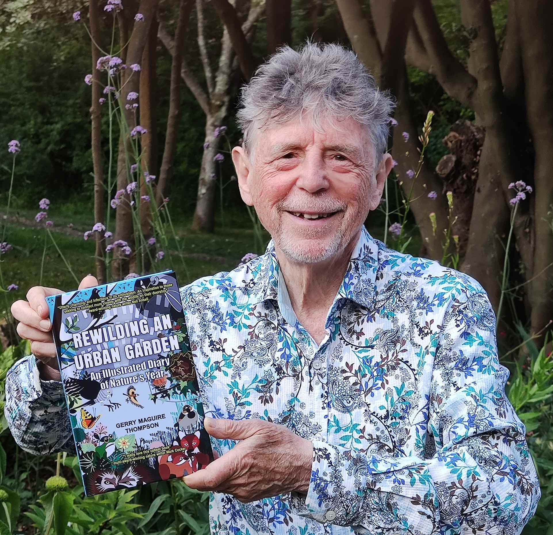 Gerry Maguire Thompson-author-photo-with-book-in-his-hand